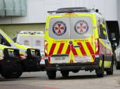 Ambulances parked at the emergency entrance to John Hunter Hospitals were security staff will take part in a trial to gauge the effectiveness of body-worn cameras to stem the rising number of assaults. Picture by Peter Lorimer