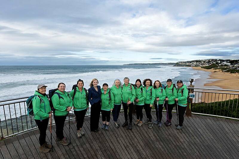 Dawn Walker (4th left), CEO of Jenny's Place, and Donna George, Jenny's Place Community Relations Coordinator, with some of the women preparing for the annual "Hike To Help Jennys Place", at Bar Beach. Picture by Jonathan Carroll.