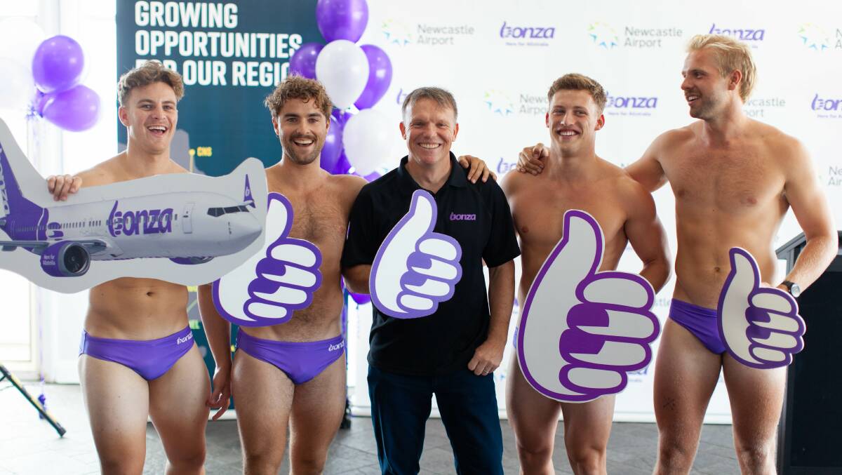 Bonza CEO Tim Jordan with local surfers at Cooks Hill Surf Lifesaving Club to welcome the new airline to Newcastle. Picture: Supplied