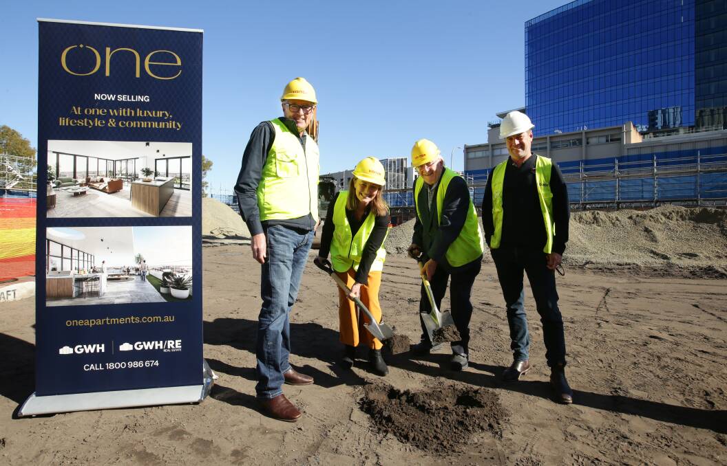 GWH director Grahame Chevally pictured far left alongside City of Newcastle councillor Peta Winney-Bartz and GWH directors Hilton Grugeon and Jonathan Craig at a sod turn event on the ONE Apartments site on Wednesday. Picture Simone de Peak.