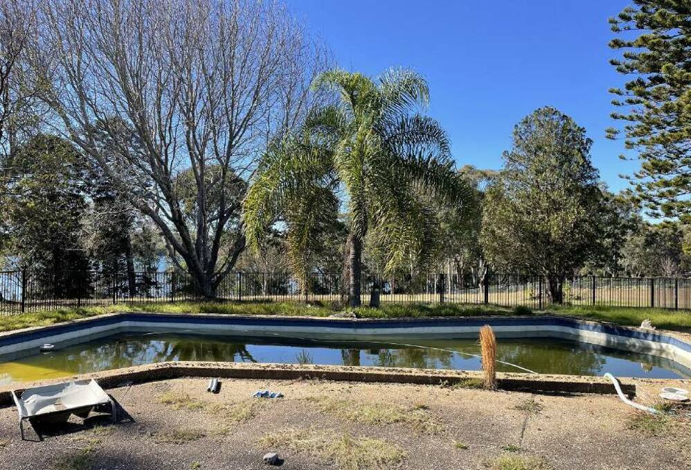 The owner paid $3.1 million for the home at 9 Rocky Point Road, Eraring in 2021 but it is now in a dilapidated state, including the pool. Picture supplied
