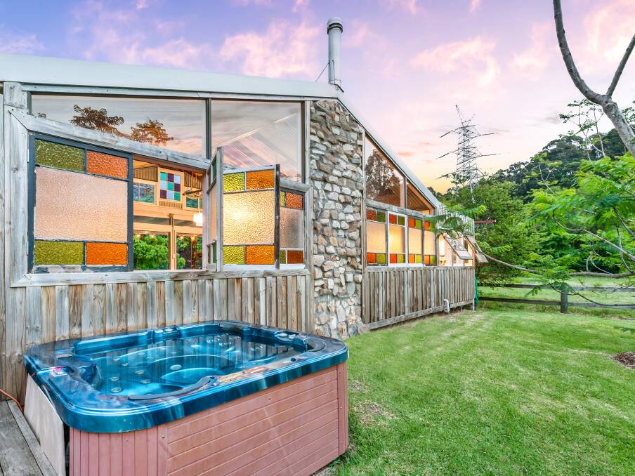 The cosy summer house is designed for entertaining with a spa tub at the rear. Picture supplied