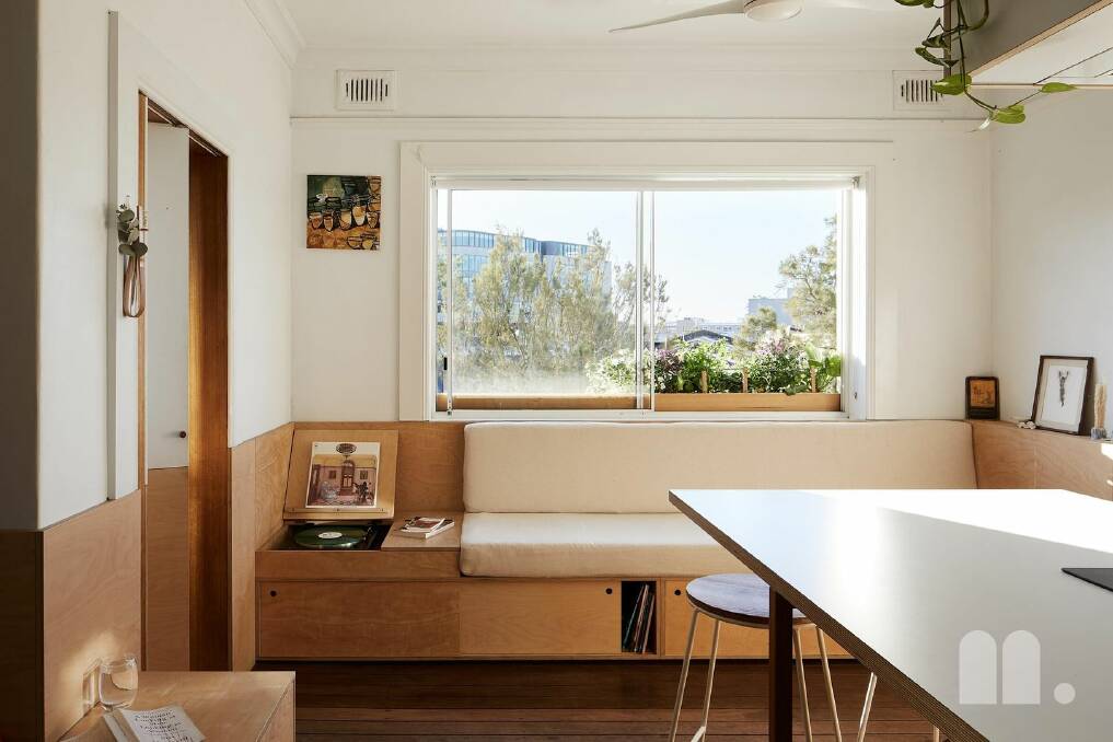 The bench seat in the kitchen includes a built-in space for a record player. Pictures Alex McIntyre
