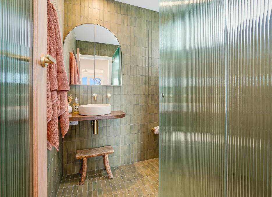 Fluted glass is a feature in the bathrooms. Picture supplied
