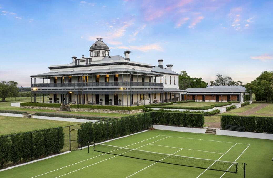 The grounds include a tennis court and landscaped gardens designed by Paul Bangay. Picture supplied