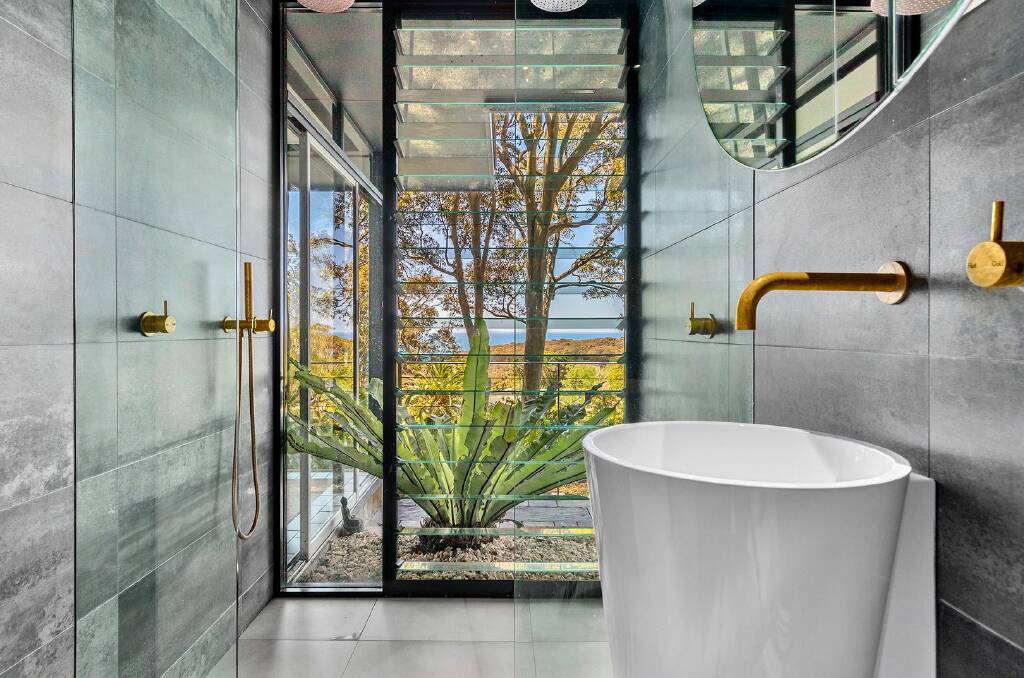 The design of the home captures views from almost every room, including the bathroom. Picture supplied