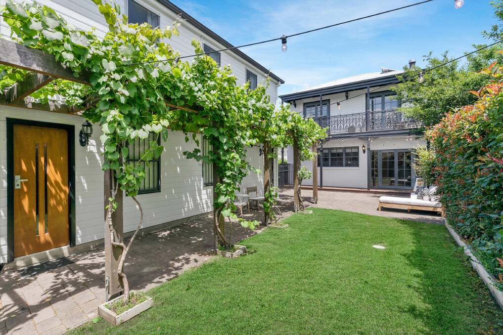 The backyard features an alfresco area covered in grapevines. Picture supplied