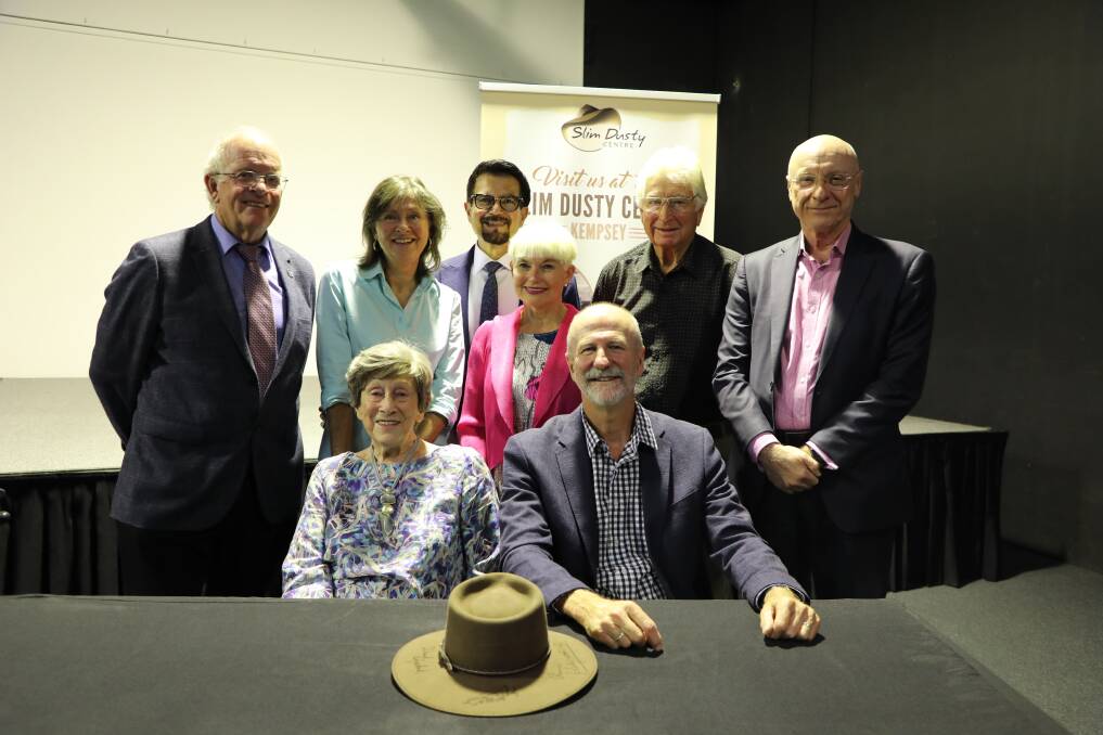 Representatives from Council, Slim Dusty Foundation and Slims wife Joy and children David and Anne, came together to hand over a signed Akubra hat as a symbol of the transfer of ownership. Picture by Annabelle Sneddon