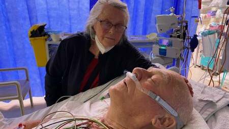 Wendy Hood at John Hunter Hospital with her husband Greg, 85, who was seriously injured on the Fernleigh Track on Wednesday. Picture supplied