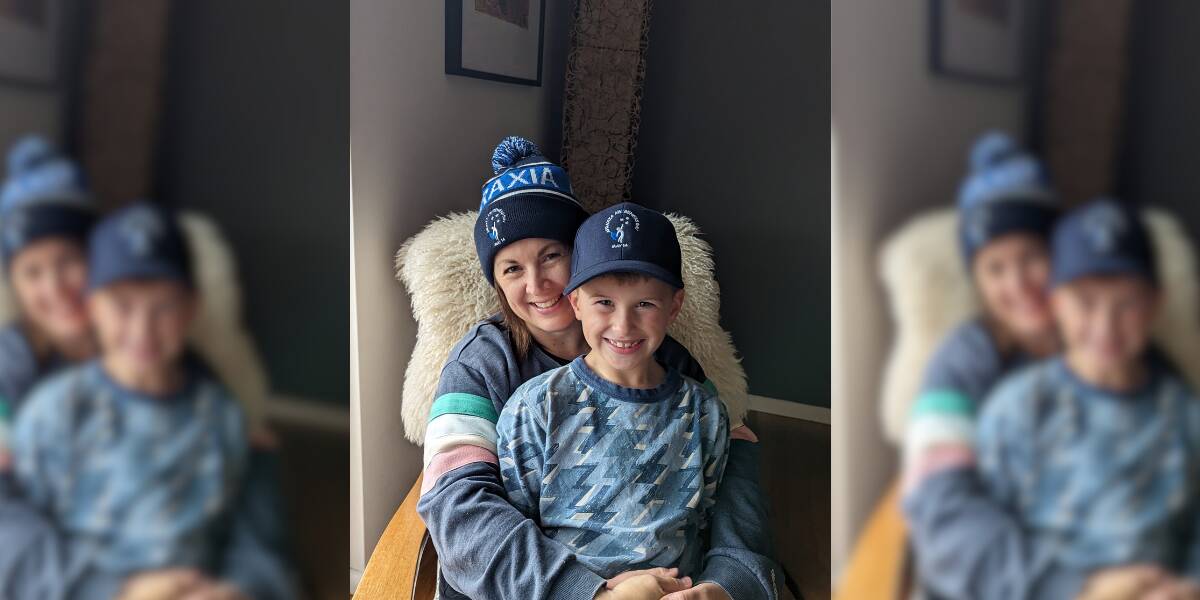 Deanne Polson with her son, Leo Polson (6), wearing Childhood Apraxia of Speech awareness merch designed by speech pathologist Evyenia Michellis. Pictures supplied 