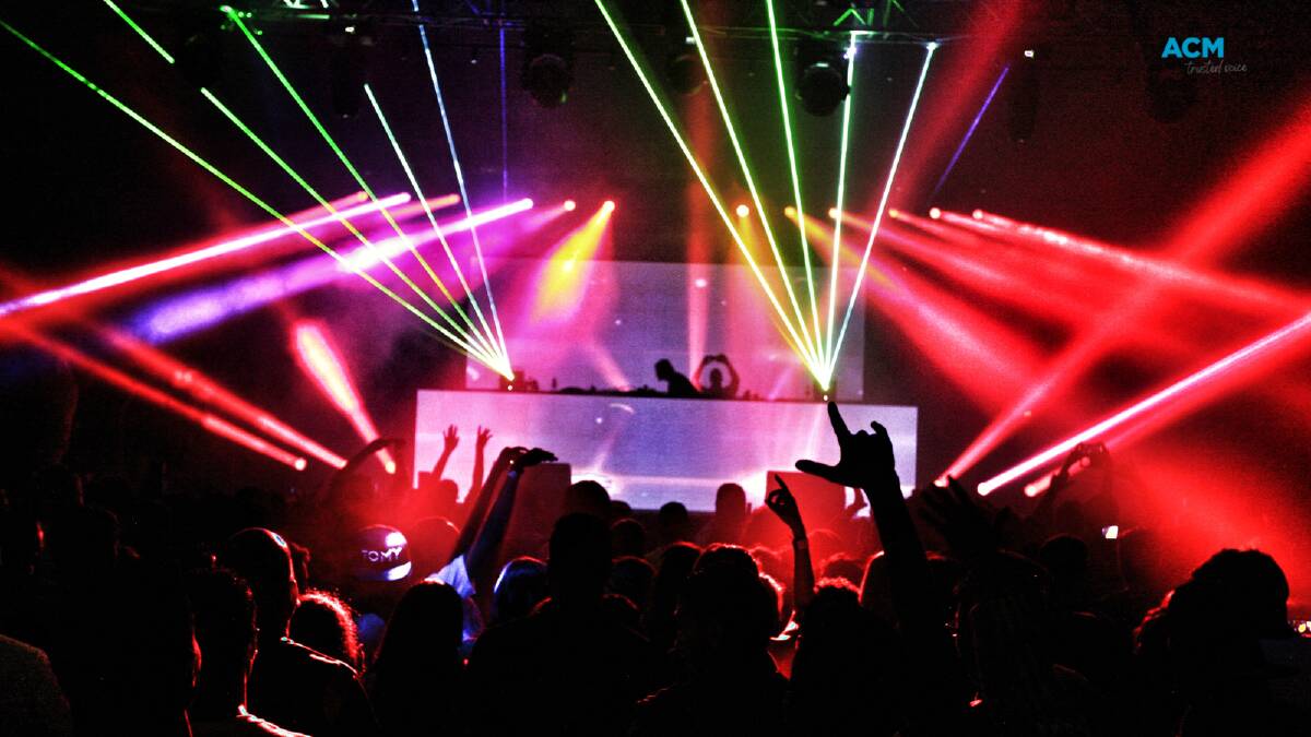 A rainbow of laser lights in a busy nightclub. File picture