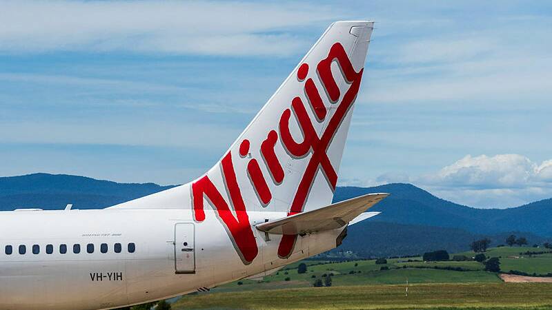 A departing Virgin plane. Picture Phillip Biggs 