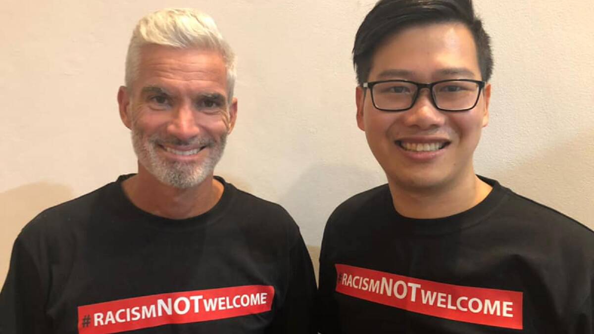 Councillor Kun Huang with Australian soccer star Craig Foster in 2021. Picture Facebook