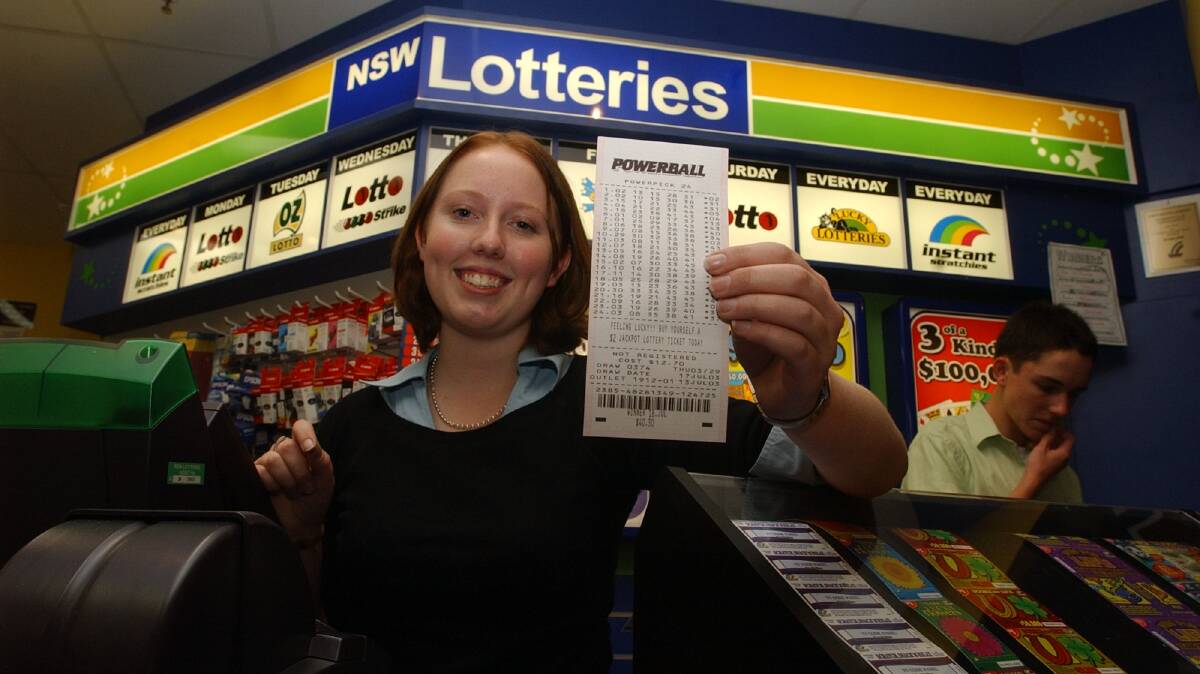 Marketplace Newsagency sales assistant Alexandra Fok with a powerball ticket. File picture