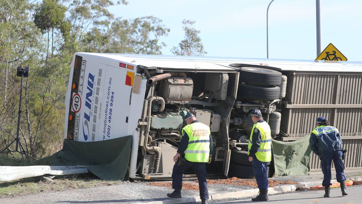 The scene at the bus crash near Greta where at least 10 people have been killed. Picture by Peter Lorimer.