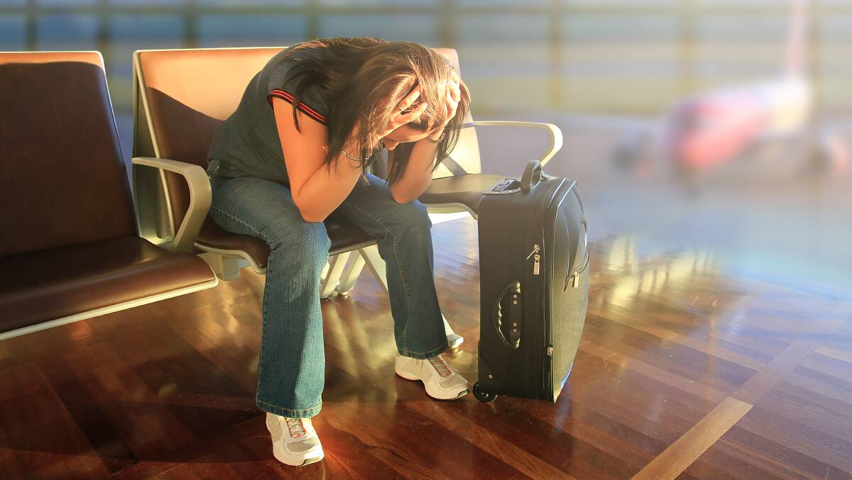 Travellers face flight delays and cancellations due to strong winds at Sydney Airport. Picture by Shutterstock