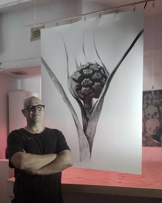 David Griffen with an artwork from his Plantlife exhbit. Picture supplied