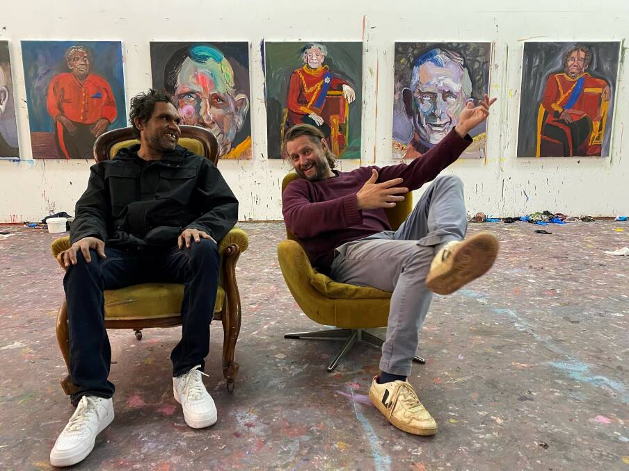 Vincent Namatjira and Ben Quilty in the studio with works they have created, some of which will show in CrownLand. Picture by Heath Aarons