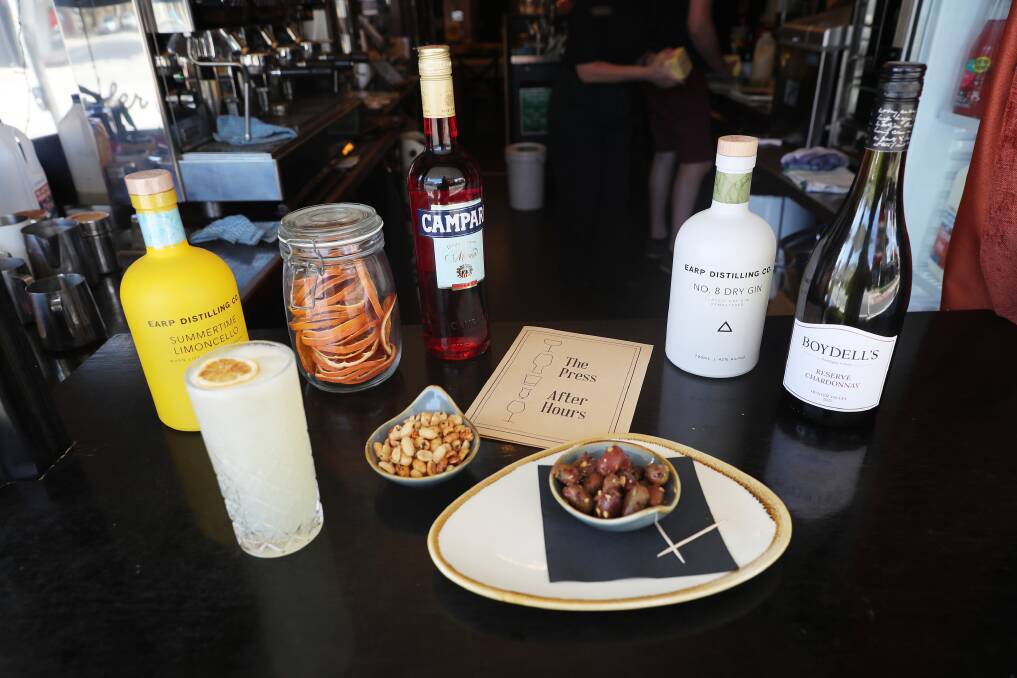 Marinated olives, warmed lemon-pepper peanuts, clever cocktails and wine.