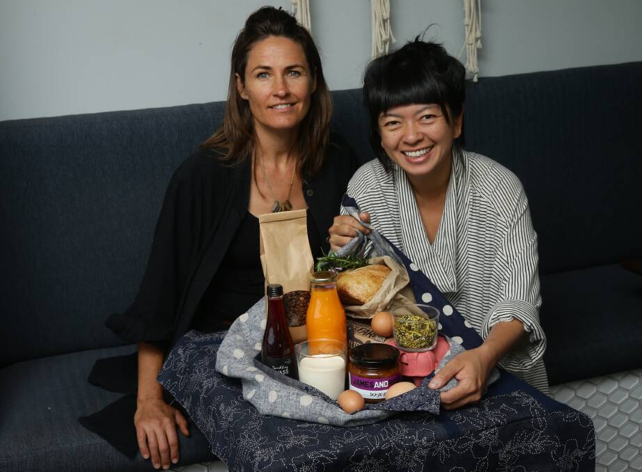 Near left, Bec Bowie with Rowena Foong in 2020 with DIY COVID breakfast pack. Picture by Jonathan Carroll