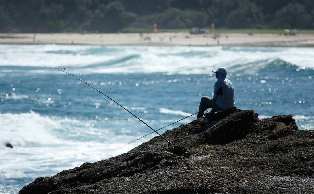 A CALCULATED RISK: The rocks at Snapper Point in Frazer Park are popular with fishermen, most of whom don't wear life jackets. Fifteen people have died in as many years rock fishing in Catherine Hill Bay. Picture: Max Mason-Hubers.