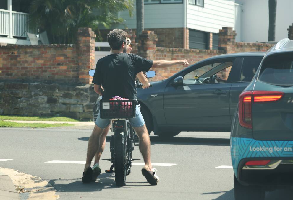 E-bike riders without helmets. Picture by Peter Lorimer 