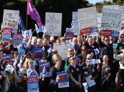 Nurses and midwives rallied at John Hunter Hospital on Tuesday for better pay and conditions. Picture by Simone De Peak   