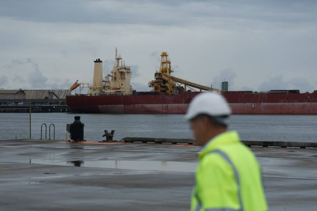 A coal ship filling up at the Kooragang coal loader at the Port of Newcastle. Picture by Max Mason-Hubers 