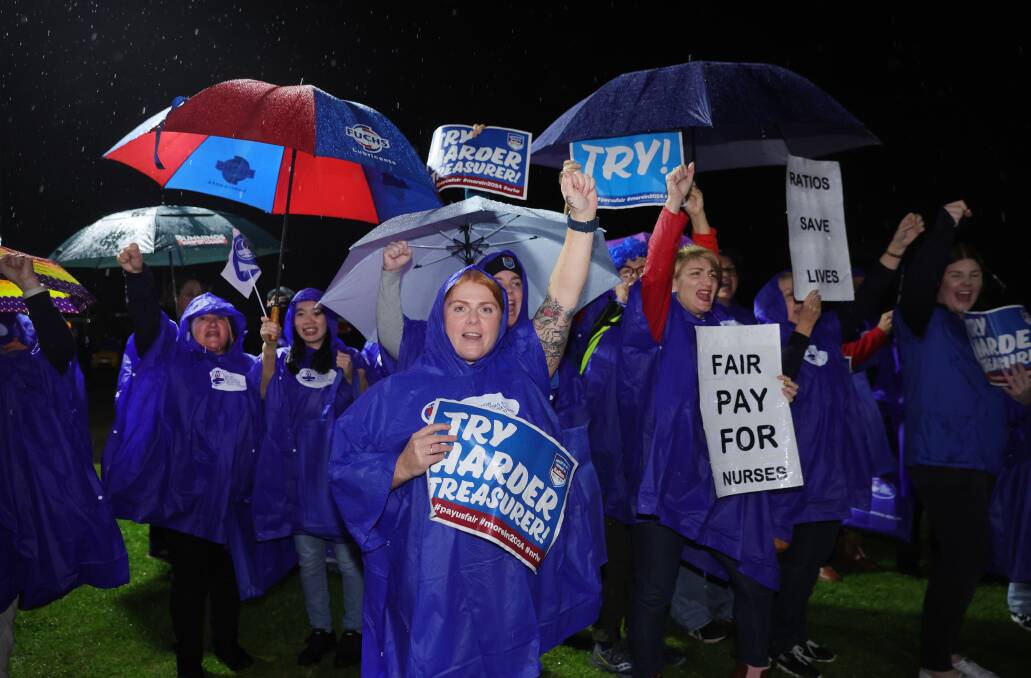 NSW nurses and midwives rallied for better pay outside McDonald Jones Stadium before the women's State of Origin game in June. Picture by Marina Neil 