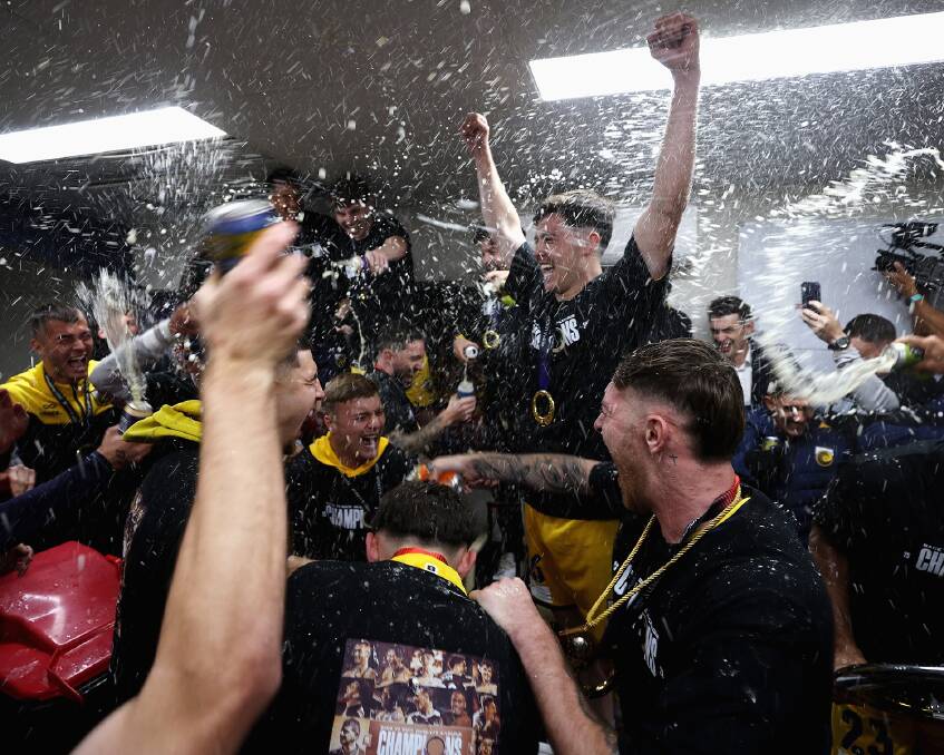 The winners celebrating in the dressing room. Picture supplied by Central Coast Mariners. 