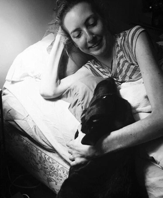 Sarah Joyce with her dog. Picture supplied 