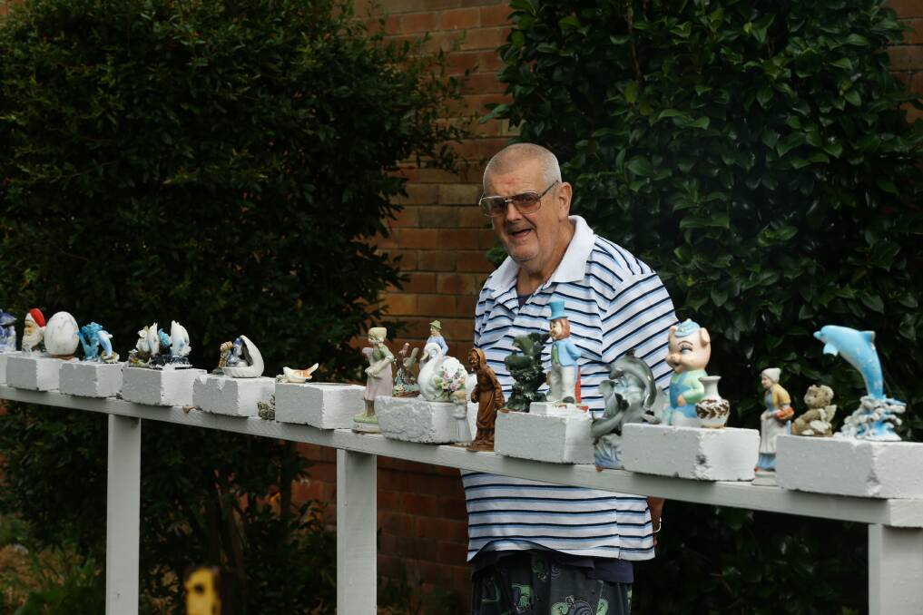Grahame 'Jacko' Geatches in December 2021 with his gnomes and other garden ornaments. Picture by Jonathan Carroll 