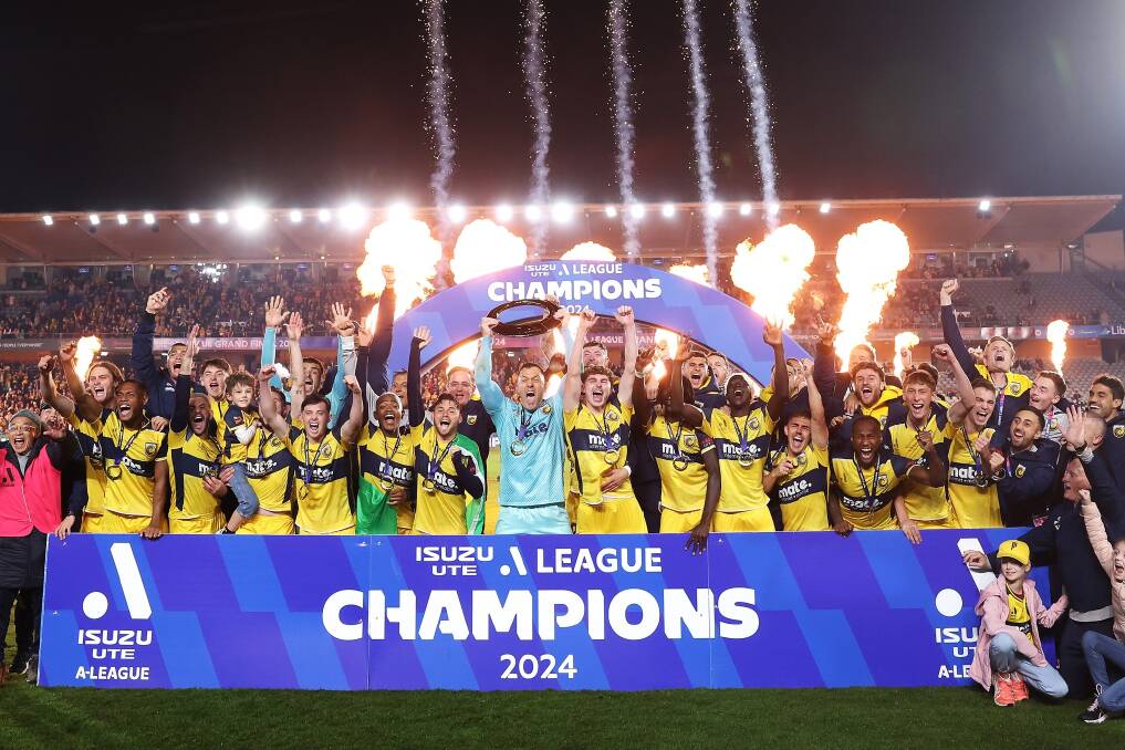 Mariners captain Danny Vukovic lifts the A-League men's championship trophy. Picture supplied by Central Coast Mariners 