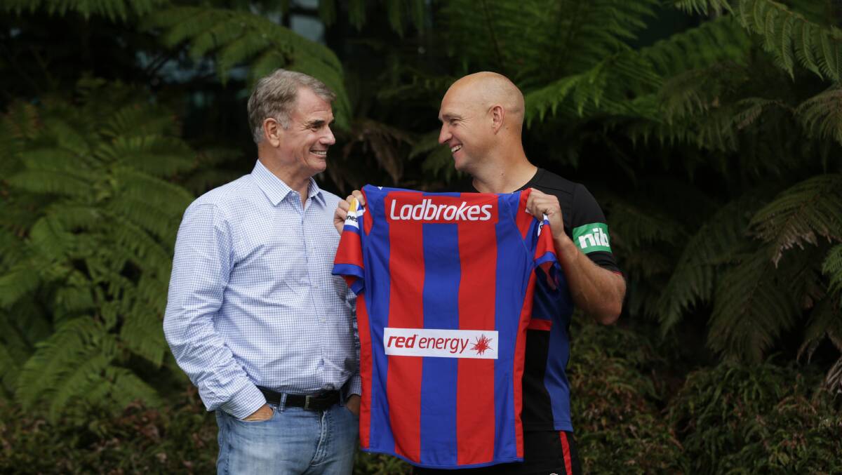 Paul Broad and Newcastle Knights coach Nathan Brown unveiling Red Energy sponsorship in November last year. Picture: Simone De Peak