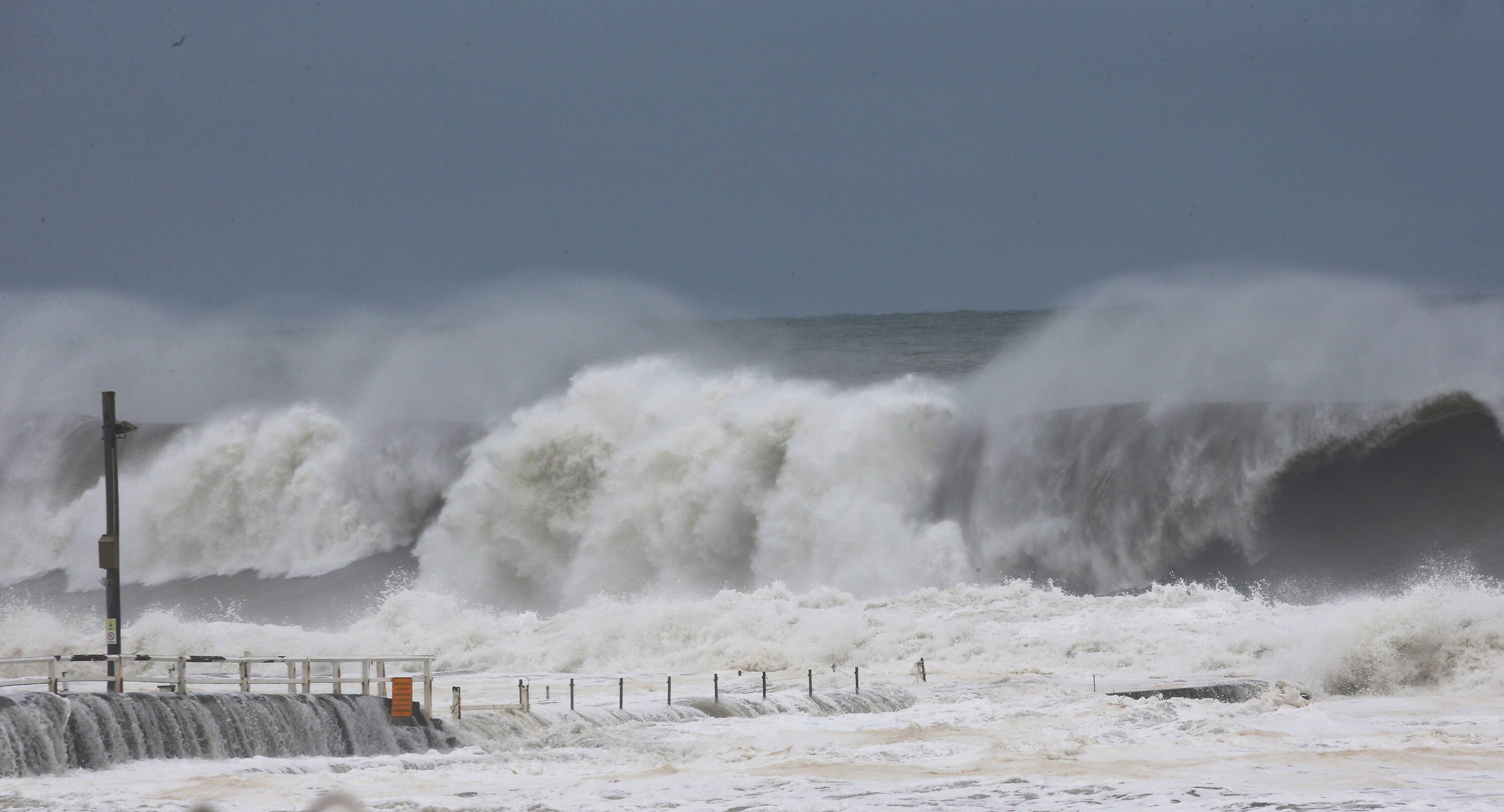 Sydney surfers brave monster waves as huge swell batters coastline