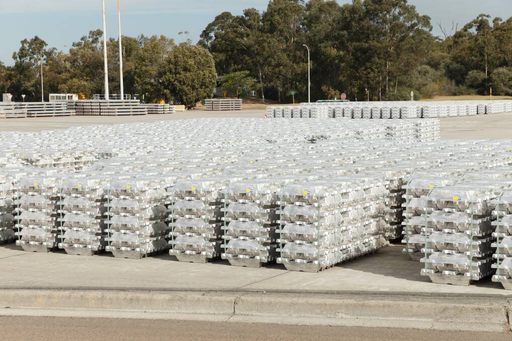 STOCKPILE: Aluminium billets stored at Tomago Aluminium ready to be trucked out. Picture: Max Mason-Hubers