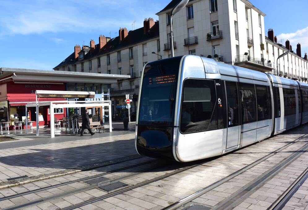 LEVEL GROUND: Light rail in Tours, France, showing the road, the rail line and the footpath all on the one level, unlike the proposal for Hunter Street, Newcastle.