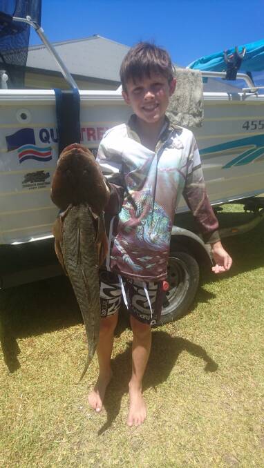 FISH OF THE WEEK: Conner Moore from Medowie wins the Jarvis Walker tacklebox and Tsunami lure pack for this 74cm flathead caught in the Hunter River.