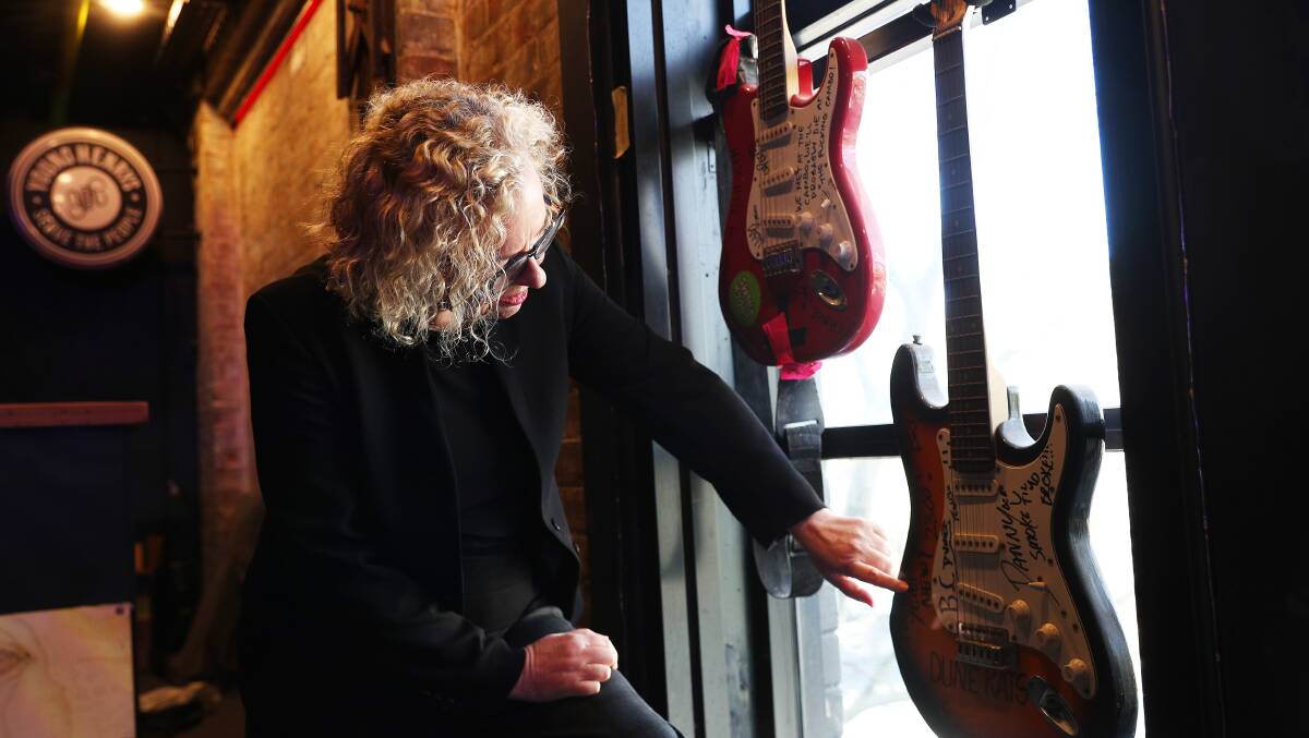 Sharon Claydon admires the guitar collection on the top floor of the new-look King Street Hotel. Picture by Peter Lorimer