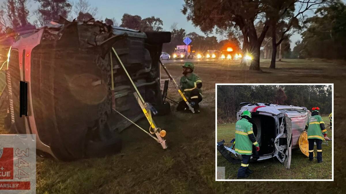 The car flipped and one man had to be cut free from the wreckage at Abermain this morning. Picture by Fire and Rescue NSW