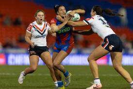 Yasmin Clydsdale charges into the Roosters' defence. Pictures by Jonathan Carroll
