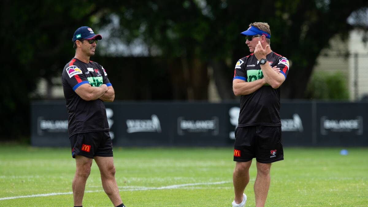 Andrew Johns, left, and Knights coach Adam O'Brien. Picture by Marina Neil