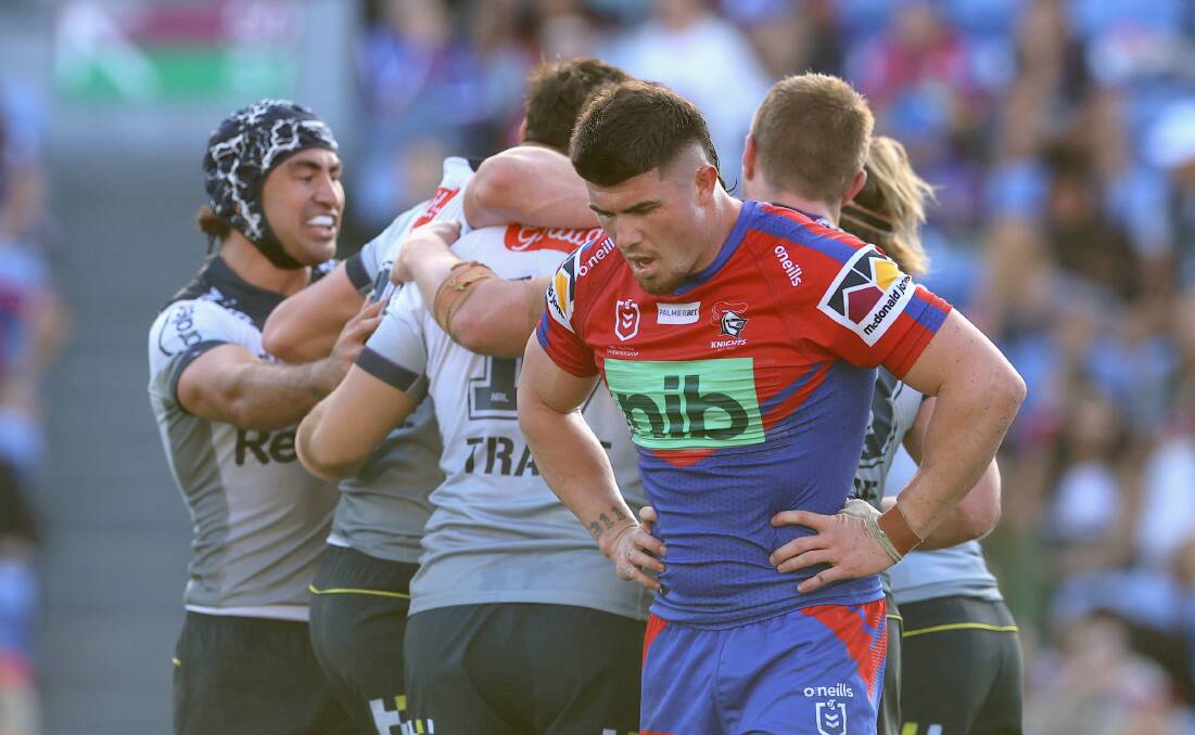 Knights centre Bradman Best ponders another Storm try during last year's 50-2 slaughter. Picture Getty Images