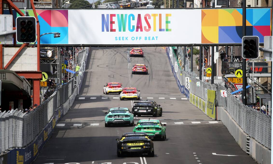 Action from this year's V8 Supercars race in Newcastle. Picture by Peter Lorimer