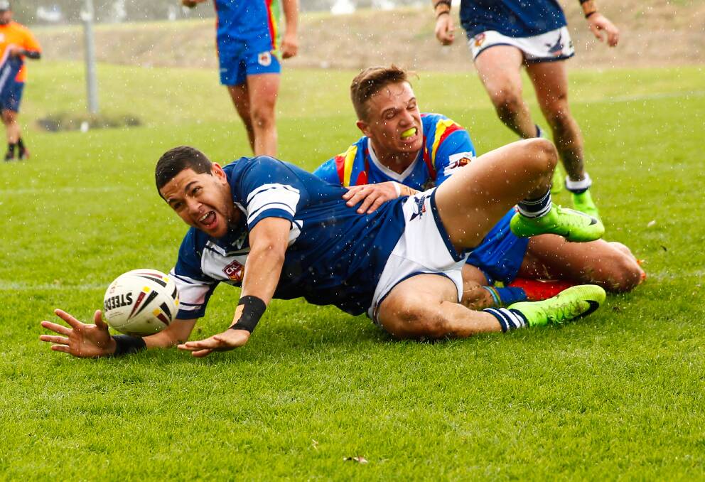 Jacob Gagai scoring a try for Newcastle against Monaro. Picture by Jonathan Carroll