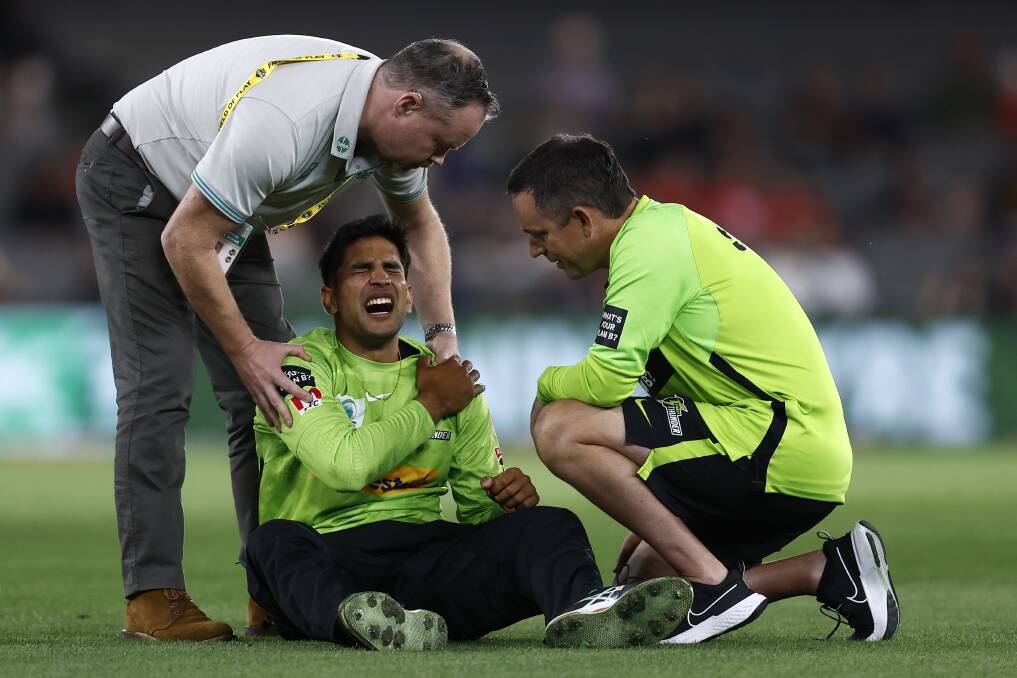 Sydney Thunder captain Jason Sangha after injuring his shoulder in Sunday night's Big Bash League loss to the Melbourne Renegades. Picture Getty Images