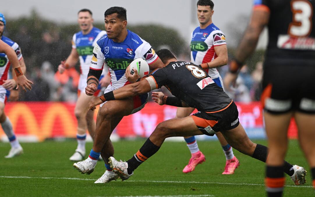 Daniel Saifiti takes a hit-up against Wests Tigers. Picture by Gareth Gardner