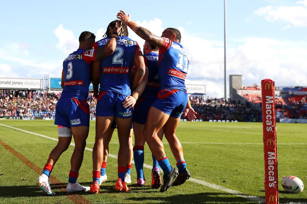 Newcastle's players celebrate Dominic Young's try. Picture by Getty Images
