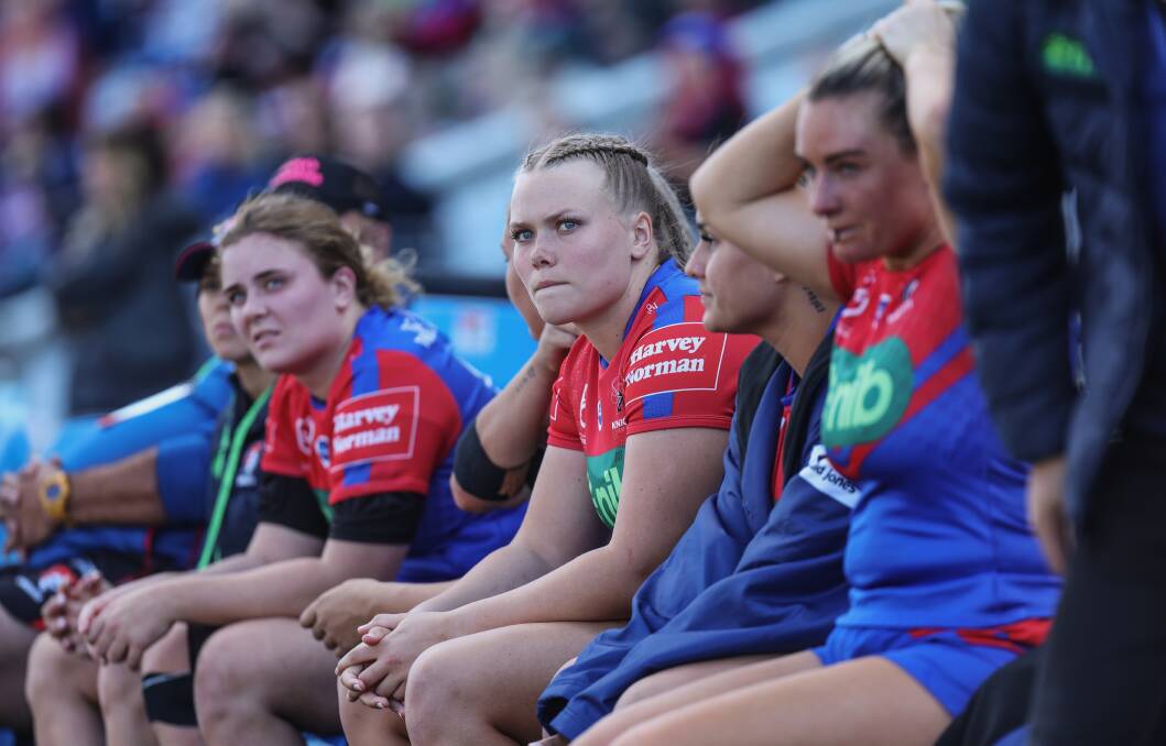 Jacy Carter watches on before taking the field in her NRLW debut against the Sydney Roosters at McDonald Jones Stadium on Saturday afternoon. Picture by Marina Neil