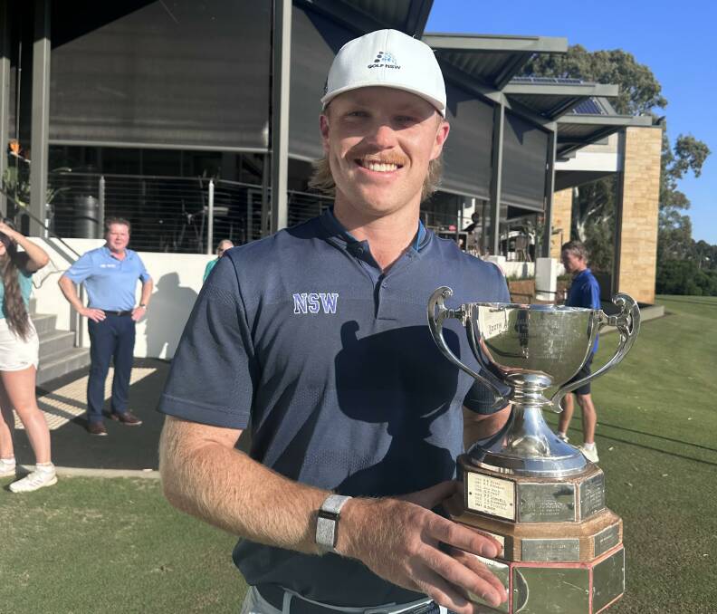 Jye Pickin with the trophy after winning the South Australian Amateur Championships on Frday. Picture Golf NSW